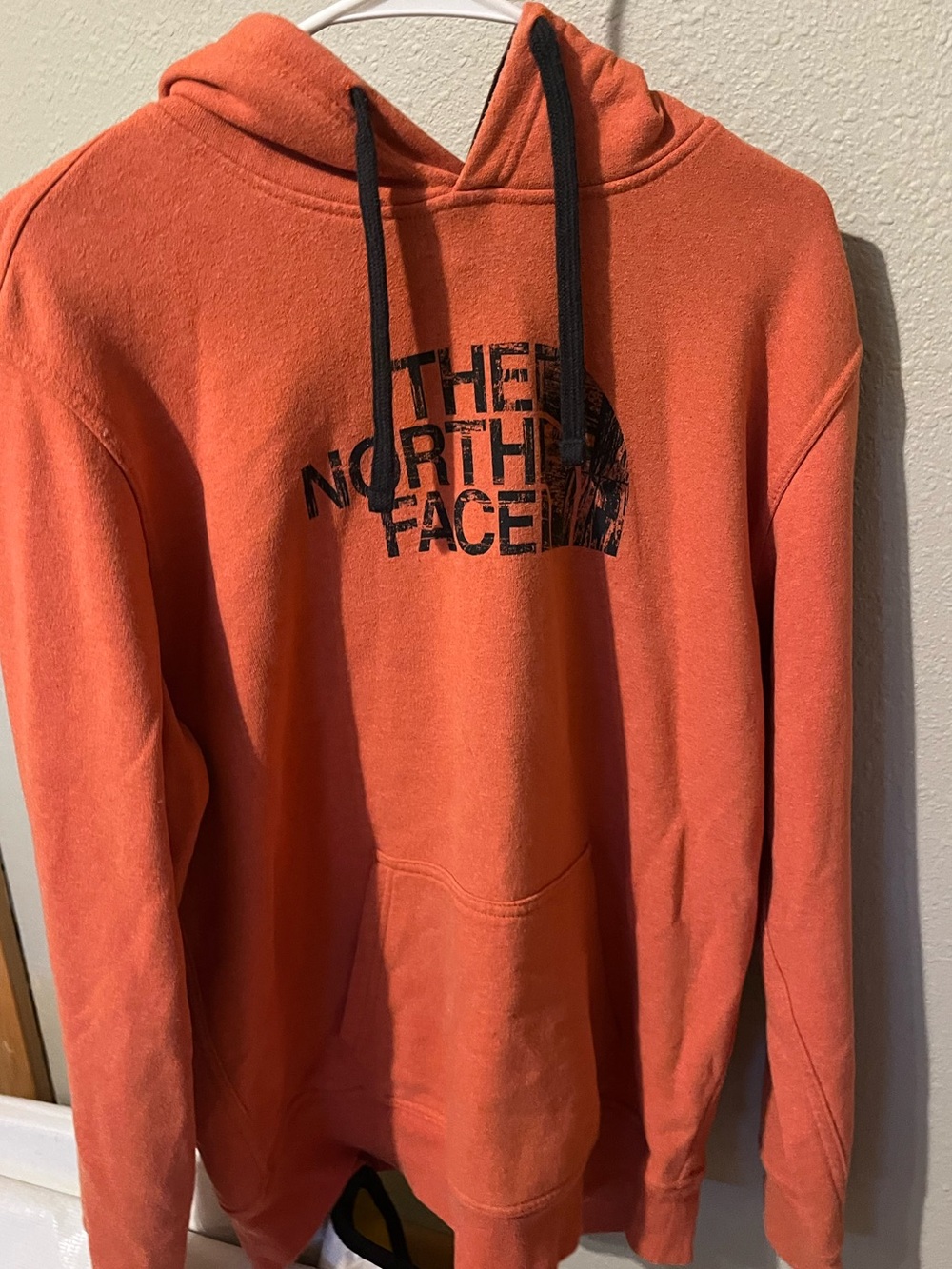 The North Face Men's Orange Hoodie with Black Logo